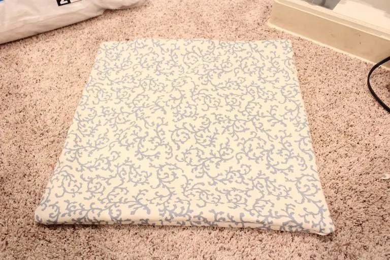 Freshly sewn pillow cover turned right side out, ready to be stuffed.