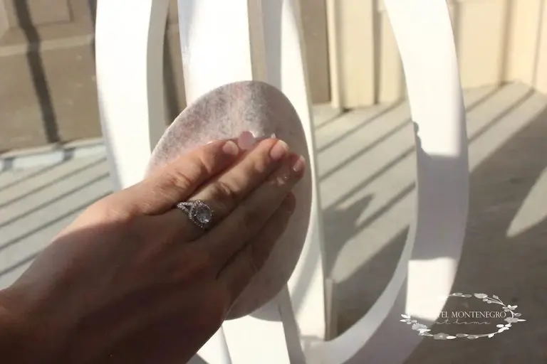 sanding a chair