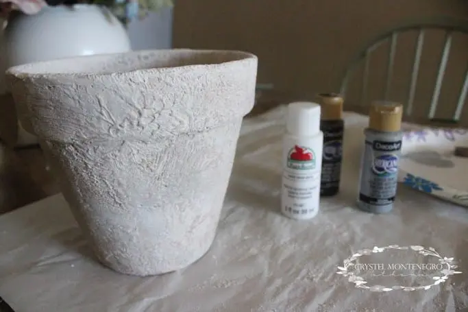 Plaster of paris on a terra cotta pot