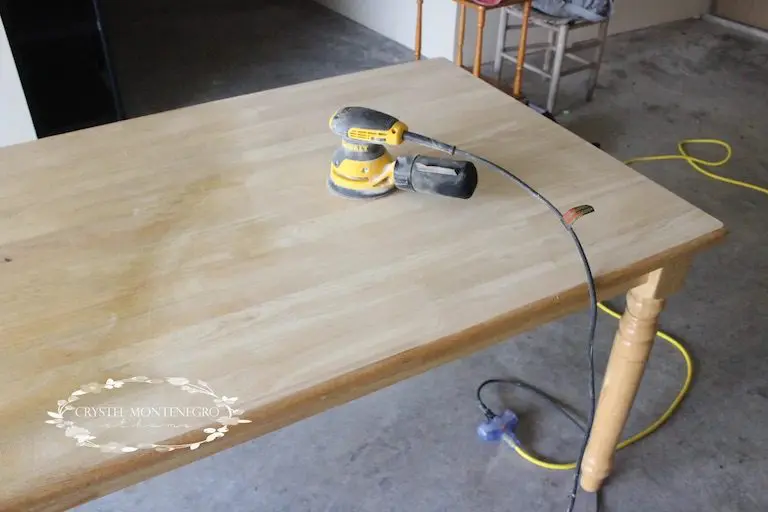 Sander on top of kitchen table