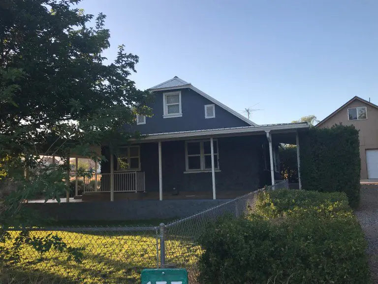 Blue house with white trim