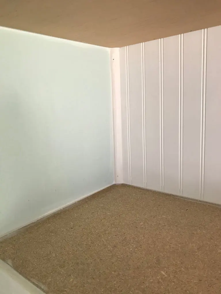 Floating shelves in laundry room