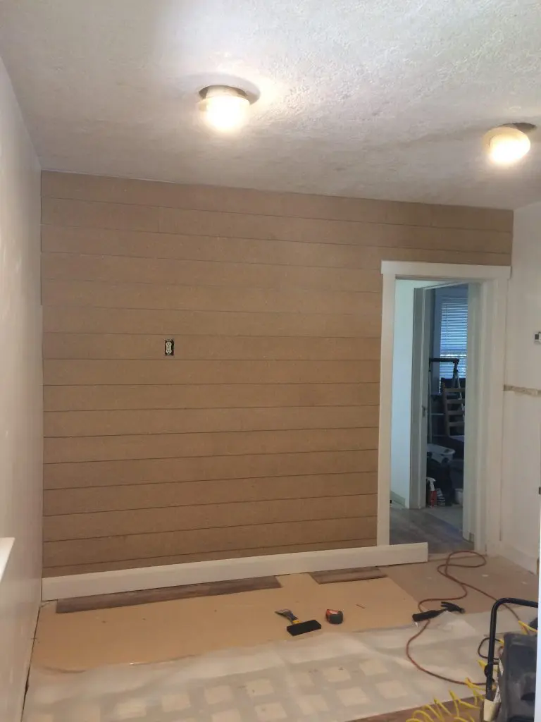 Shiplap made out of plywood on a wall