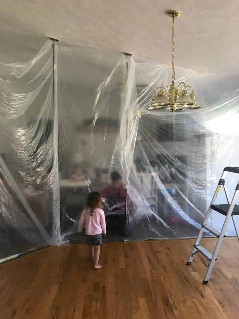 Kitchen taped with plastic sheeting