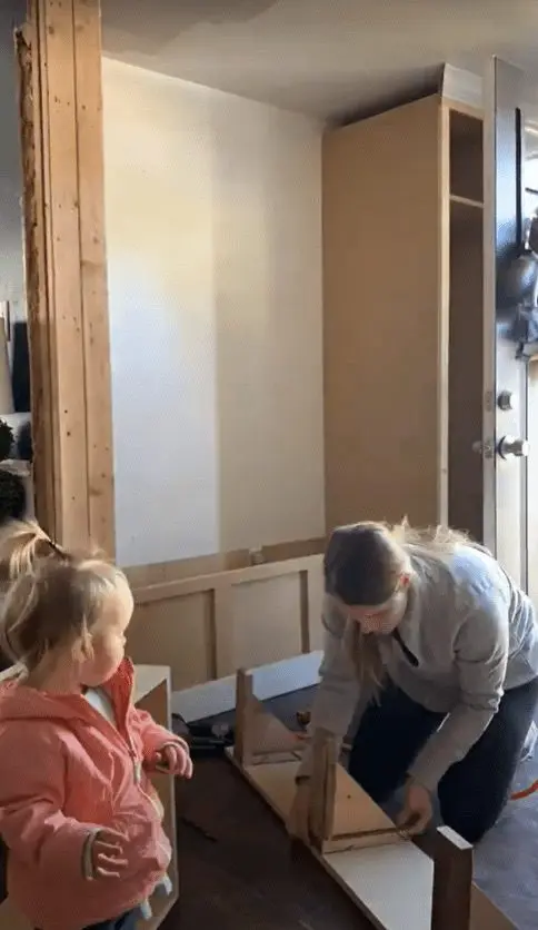Woman building a mud room
