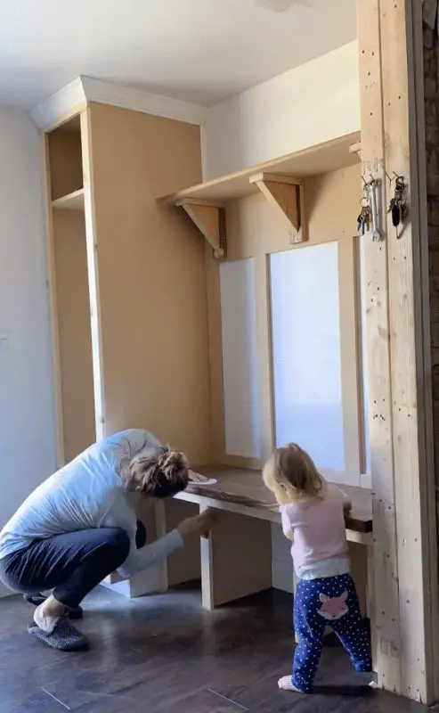 woman building mudroom