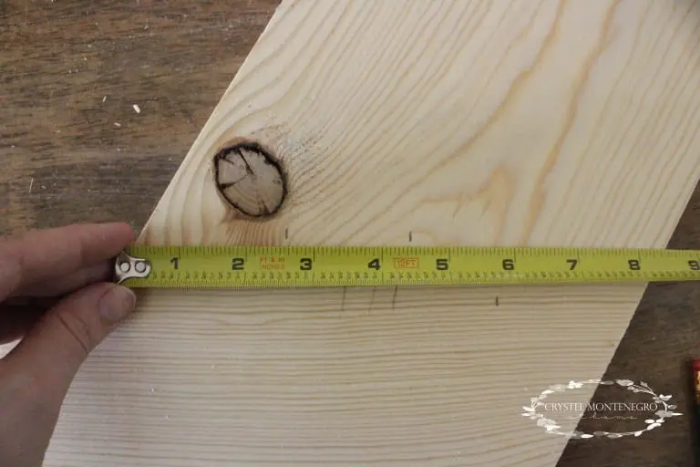 Ruler on top of a piece of wood