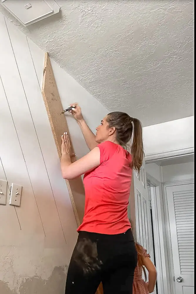 Woman creating DIY sharpie wallpaper