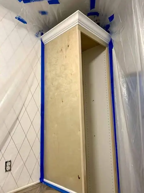 A cabinet with plastic around it