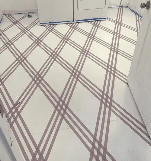 Tape on the tile in laundry room