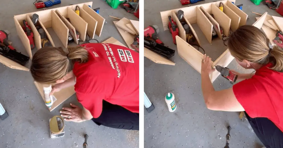 Woman in red shirt using a drill on wood