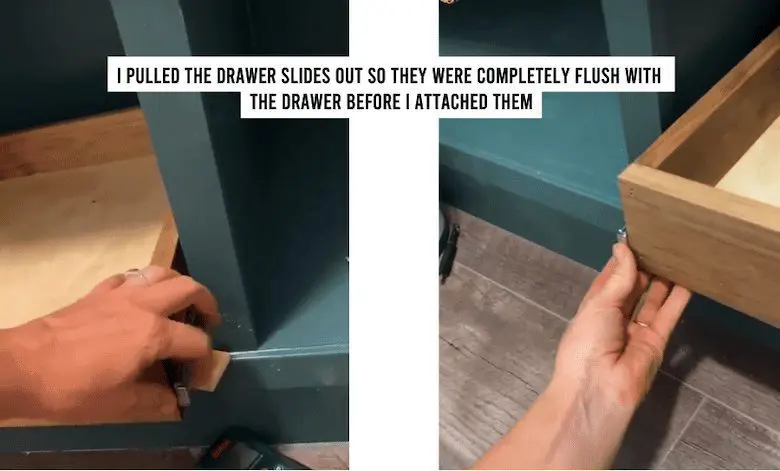 A drawer being slid into a cabinet
