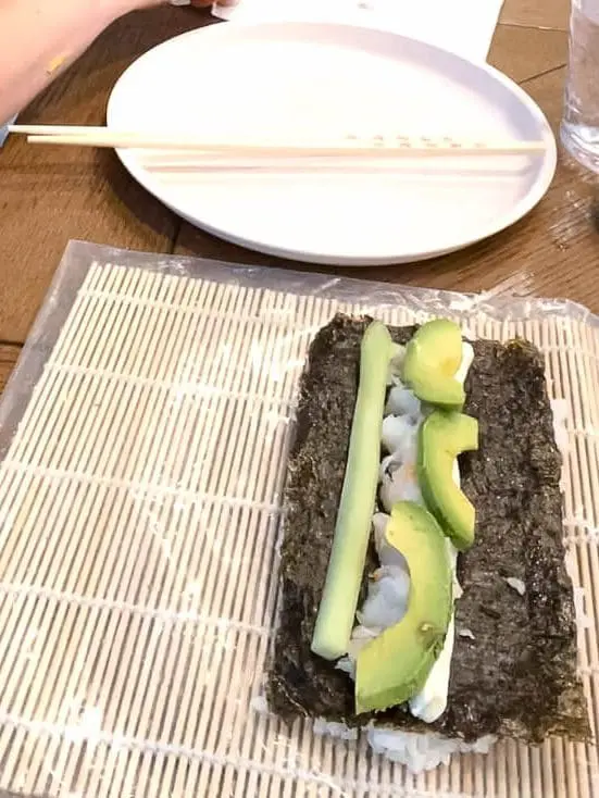 avocado, crab, rice, cucumber on sea weed