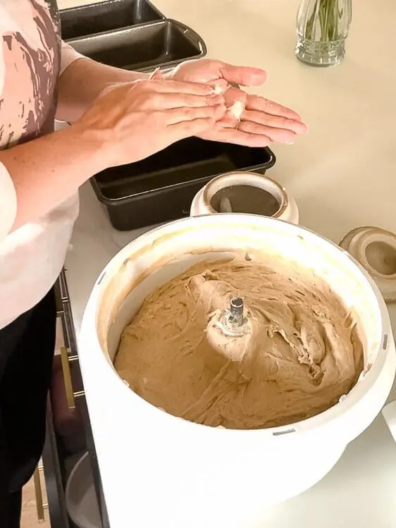 bread dough in a woman's hands