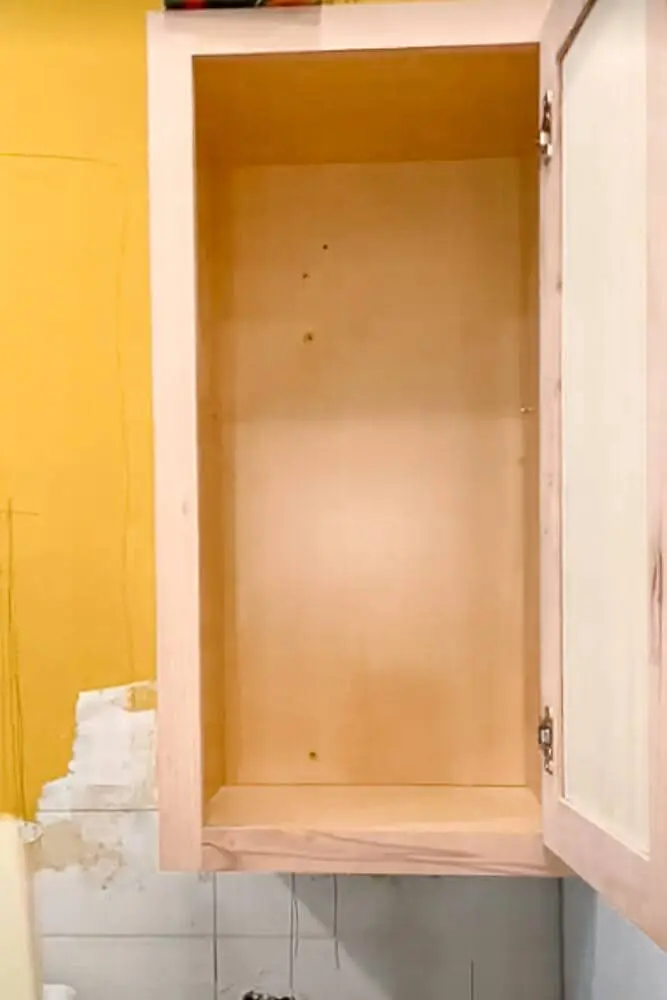 Empty and clean kitchen spice cabinet