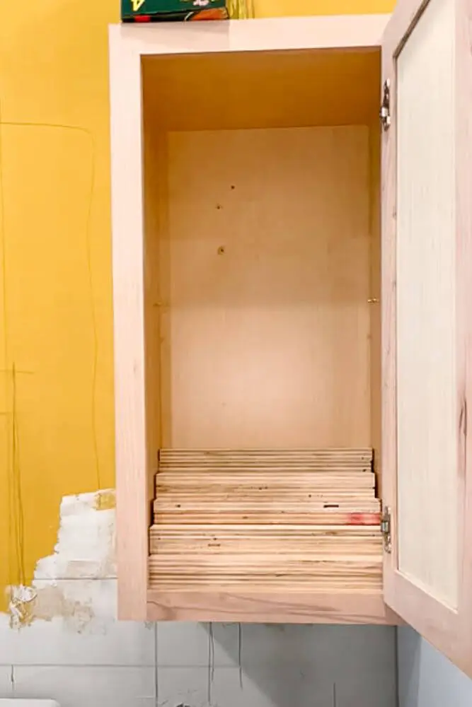 Updated 5 tiered spice rack in kitchen cabinet