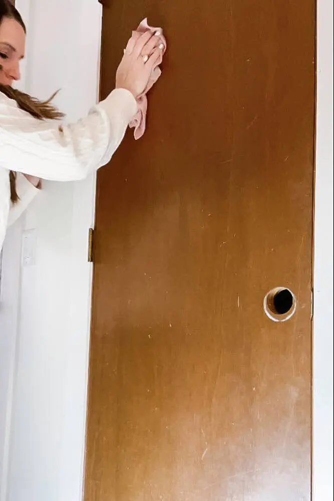 cleaning closet door after sanding mirror adhesive off