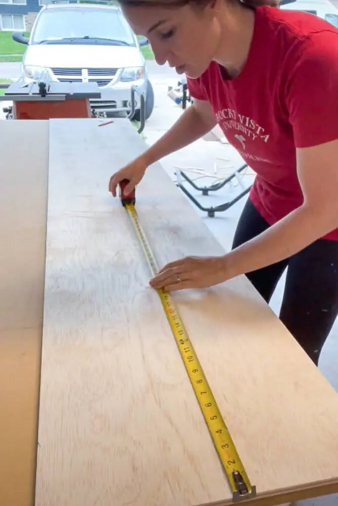 Measuring down the middle of board to make a cut