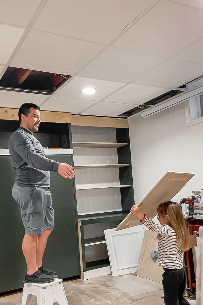 Installing a drop ceiling tile
