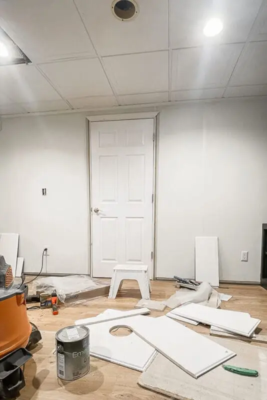 drop ceiling tiles on a basement floor