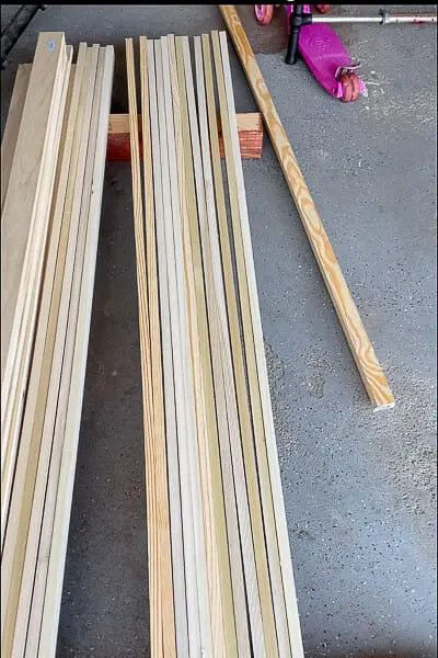 Stack of poplar wood boards laid out in garage