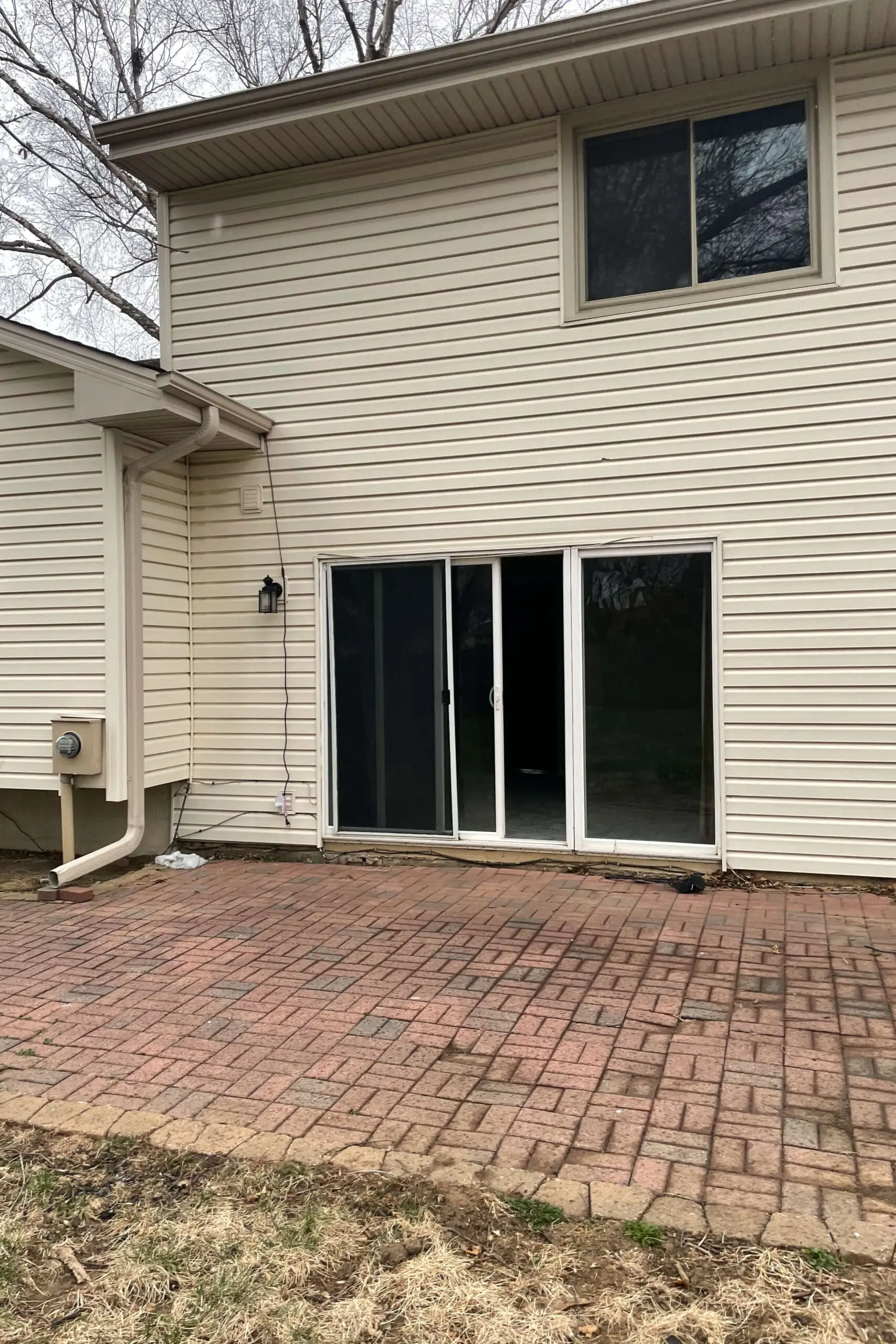 Old, dirty backyard patio.