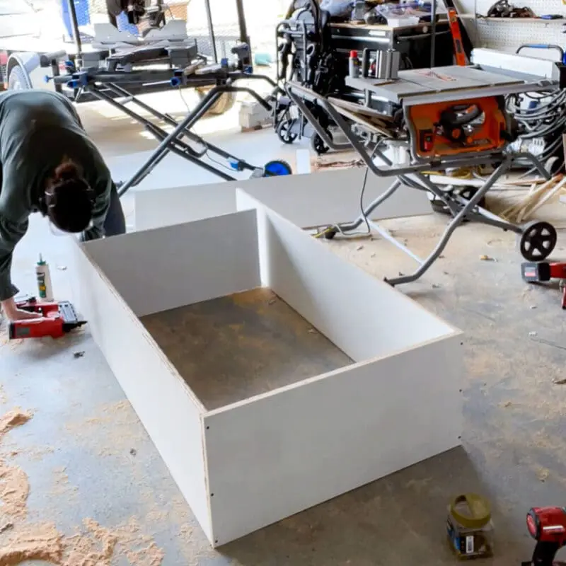 woman constructing home built ins