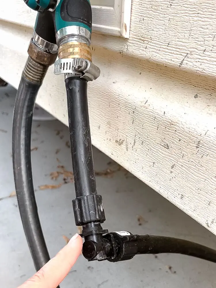 Close-up of elbow joint connecting poly tubing for Drip System for Raised Garden Beds