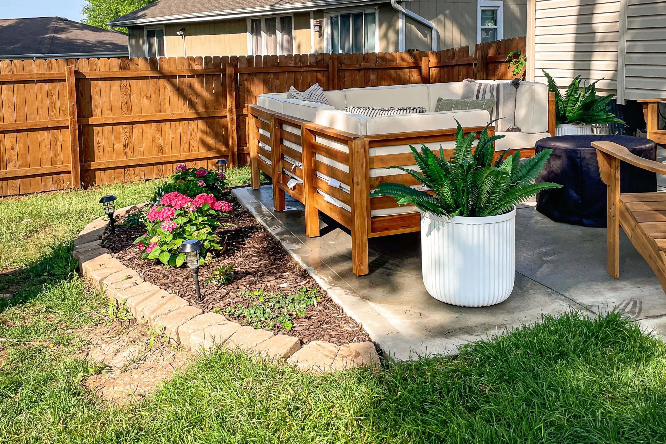 Finished flower bed around a beautiful patio.