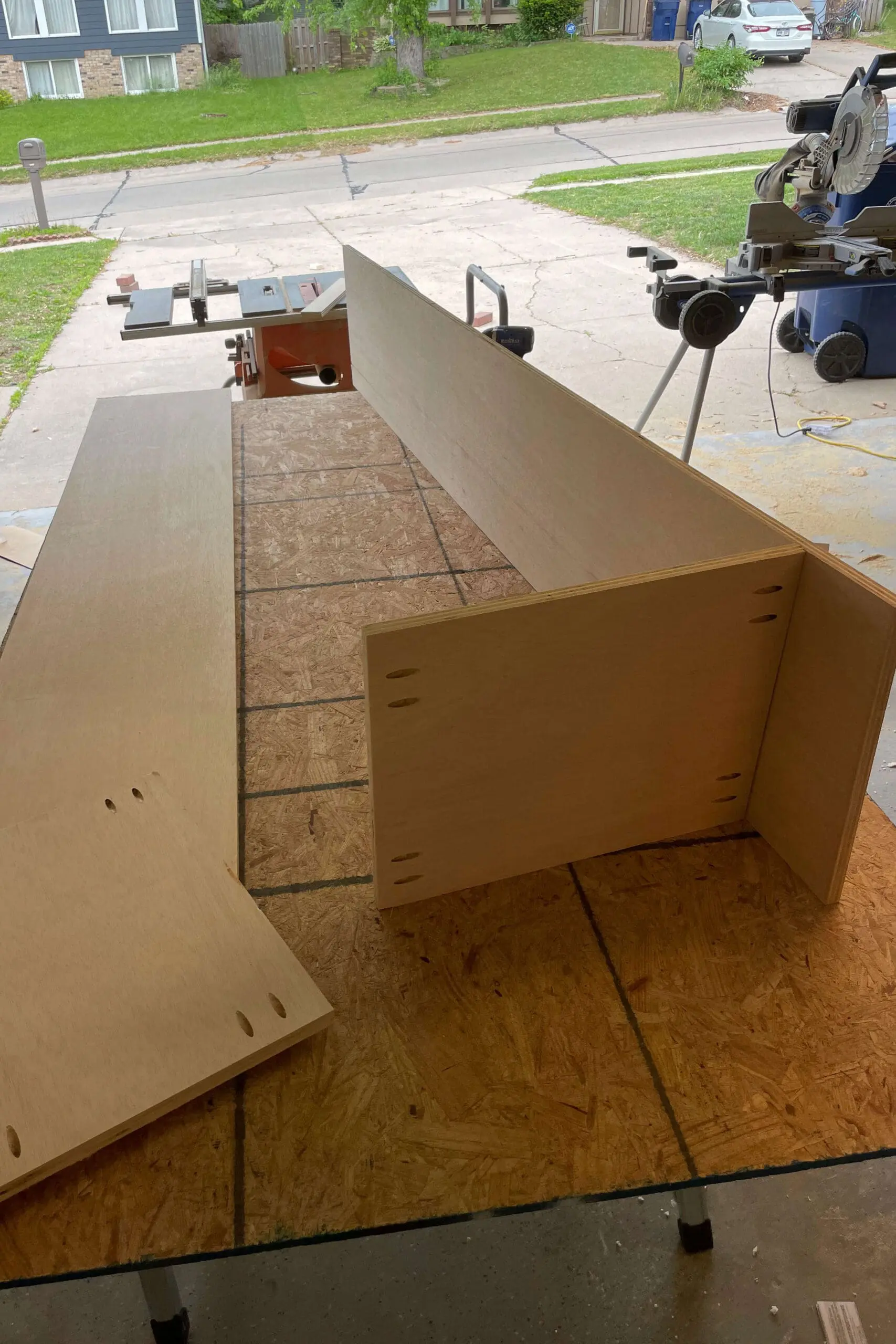 Assembling a tall pantry shelf. 