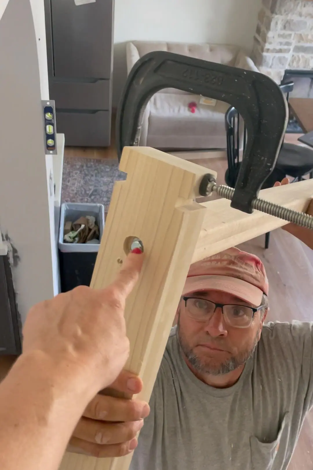 Attaching a handrail to a newel post.