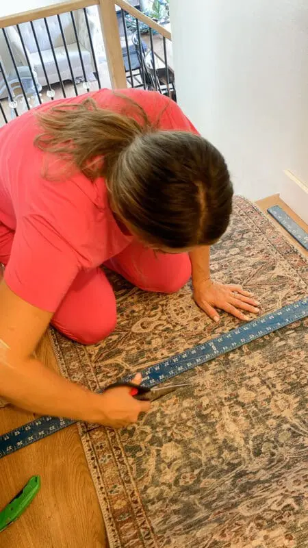 Cutting a stair runner. 