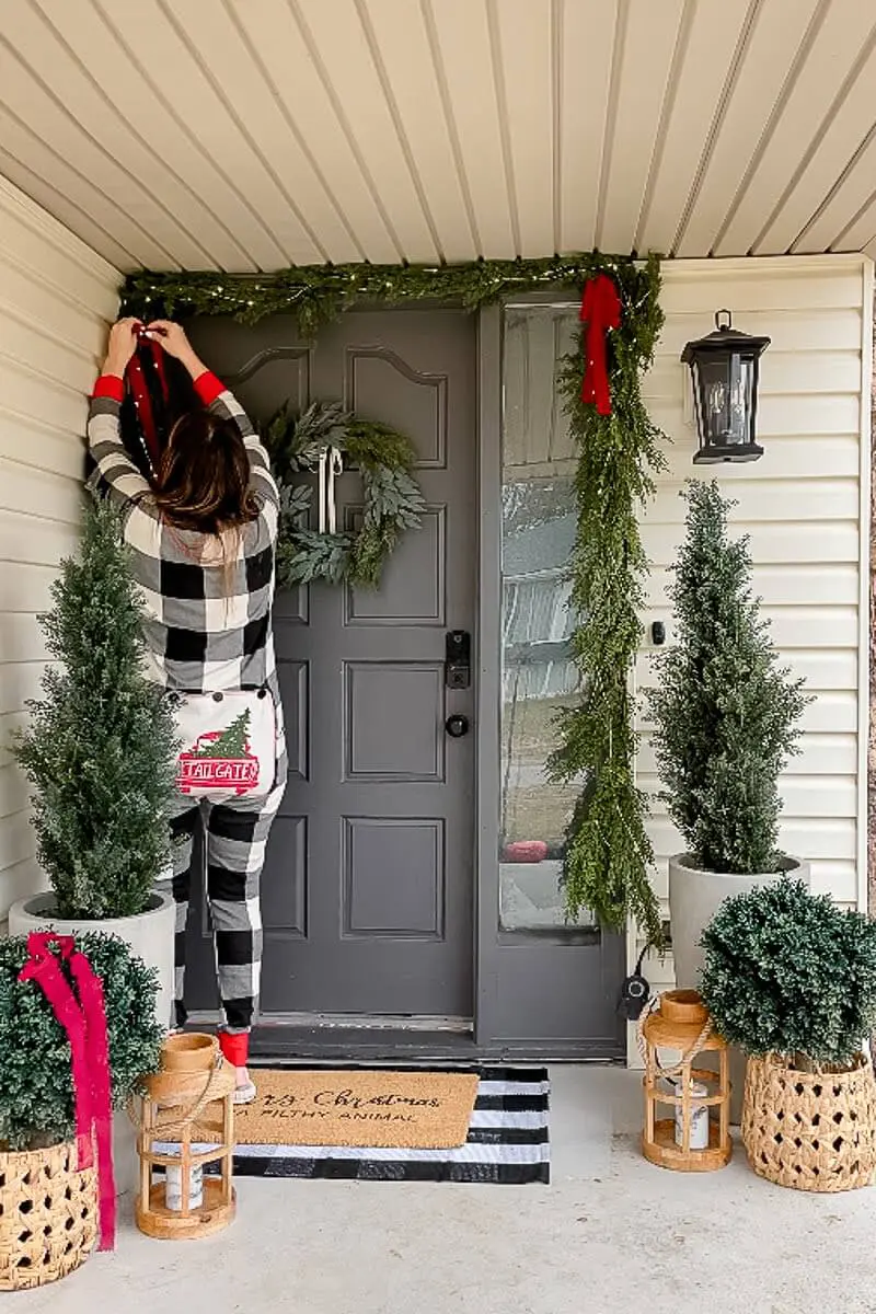 Cute, small front porch decorated for Christmas.