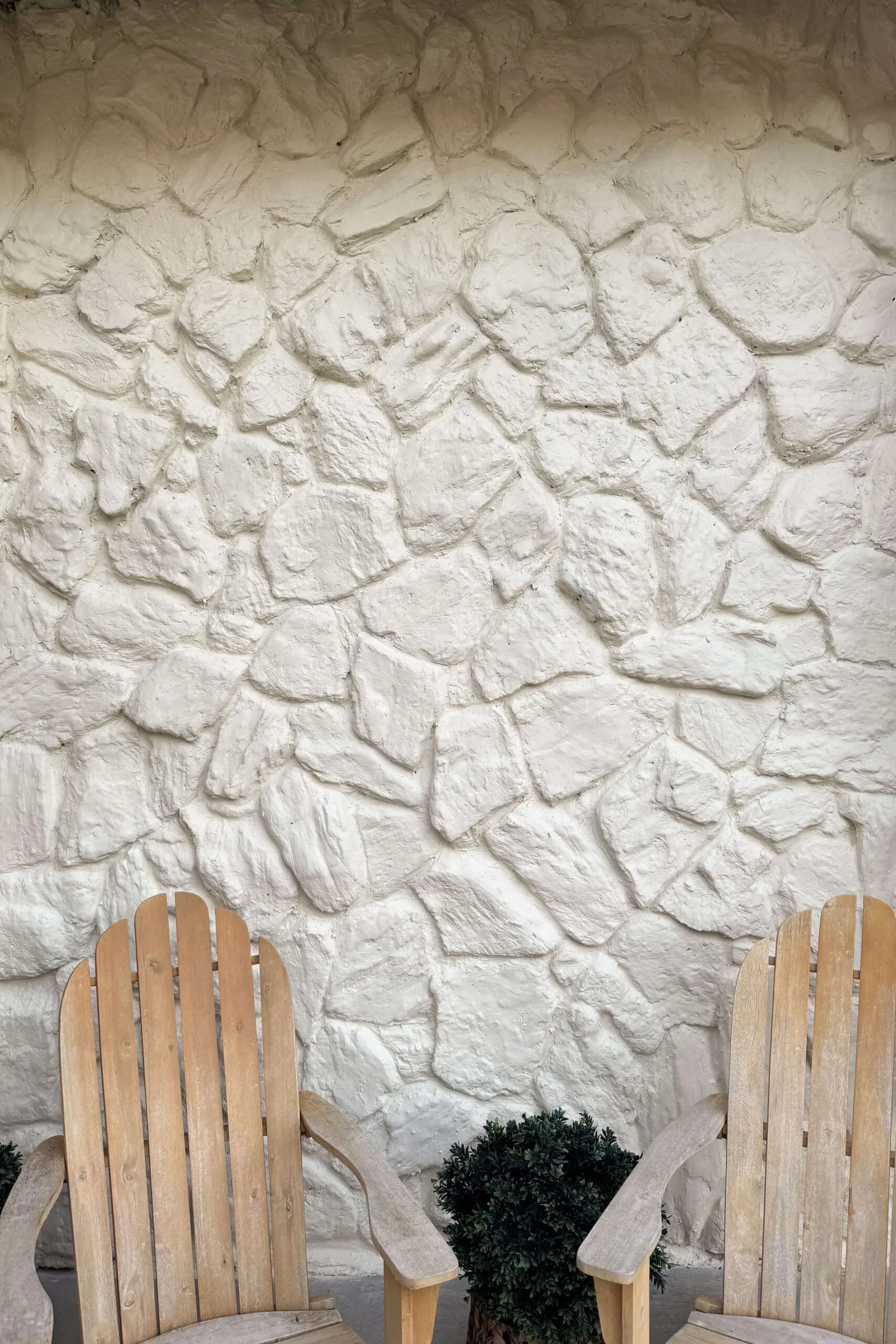 Before and after pics of my updated, 1970s rock wall.