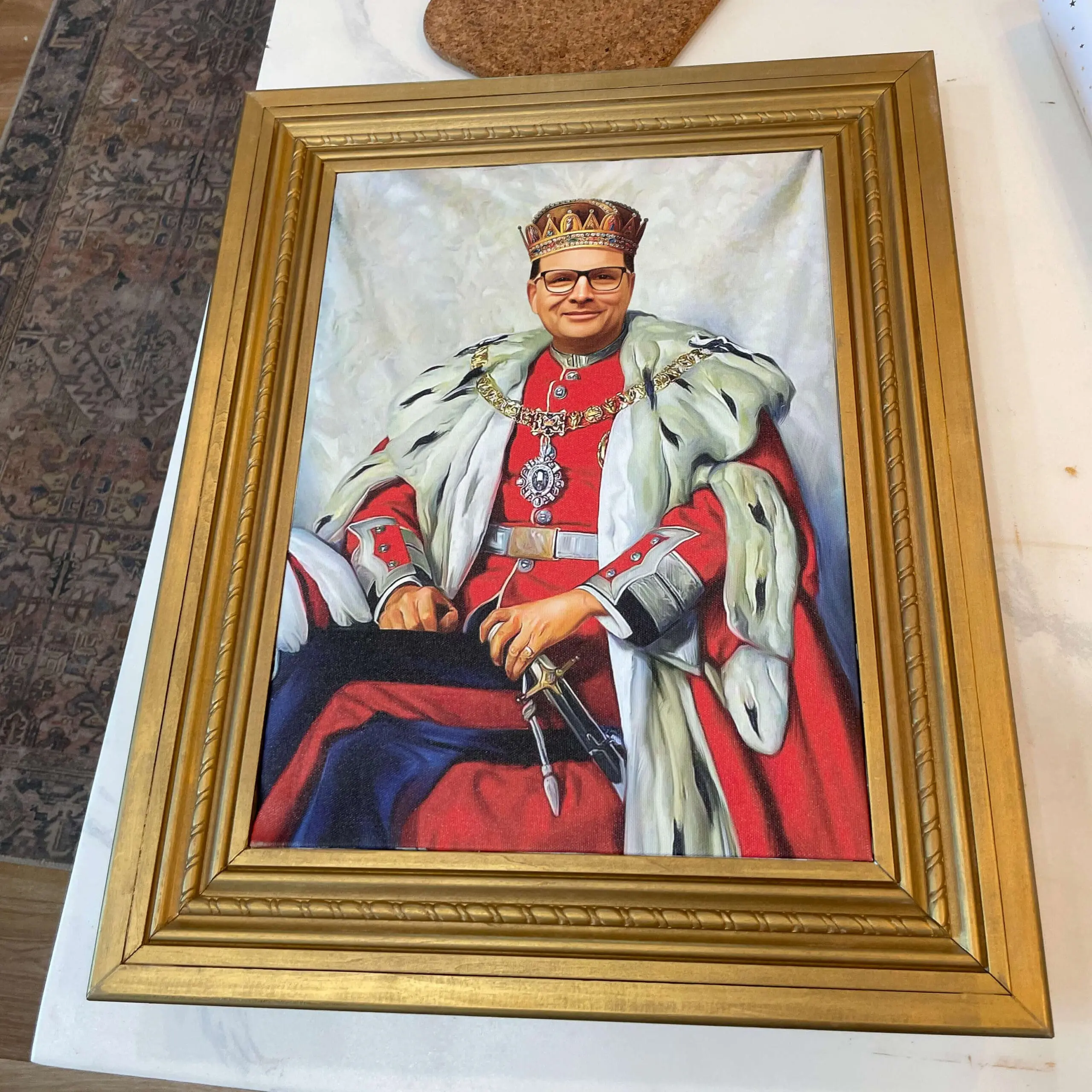 Gold DIY picture frame holding a regal canvas portrait made as a homemade Father's Day gift.