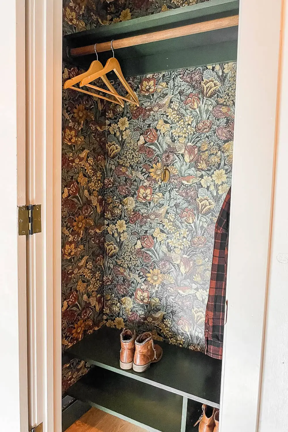 hall coat closet makeover with vintage floral wallpaper, green shelf, and boots
