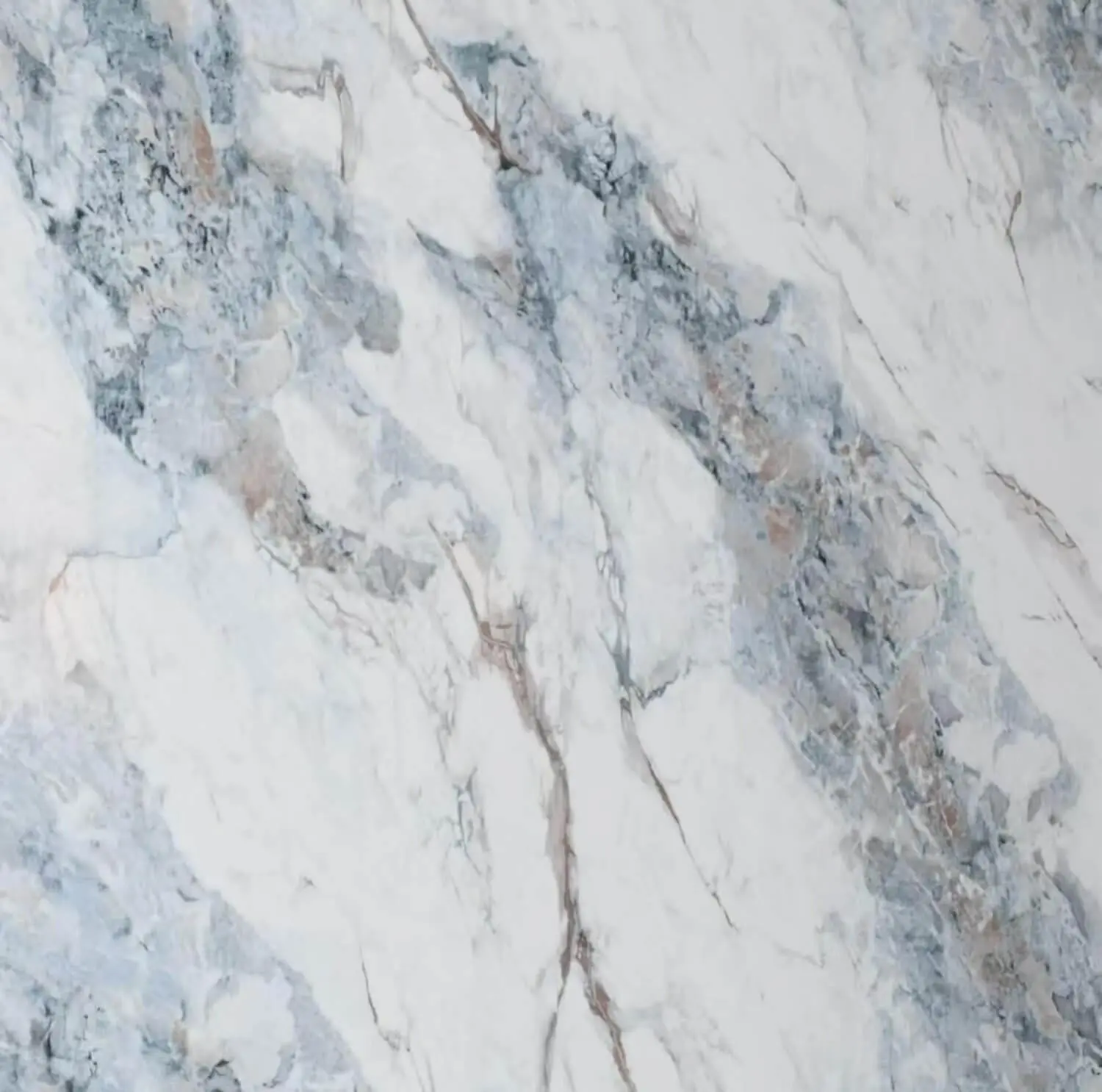 Close-up view of marble contact paper showing realistic veining and texture used to create DIY faux marble kitchen countertops.