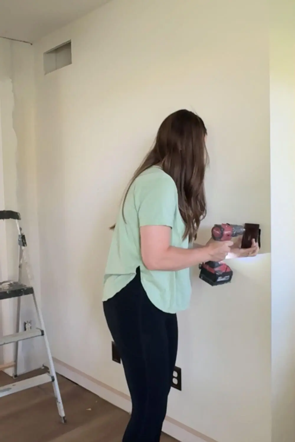 Prepping a wall before to smooth out the texture.