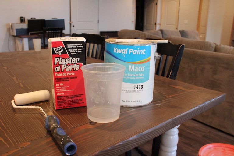 plaster of paris and paint roller on a table