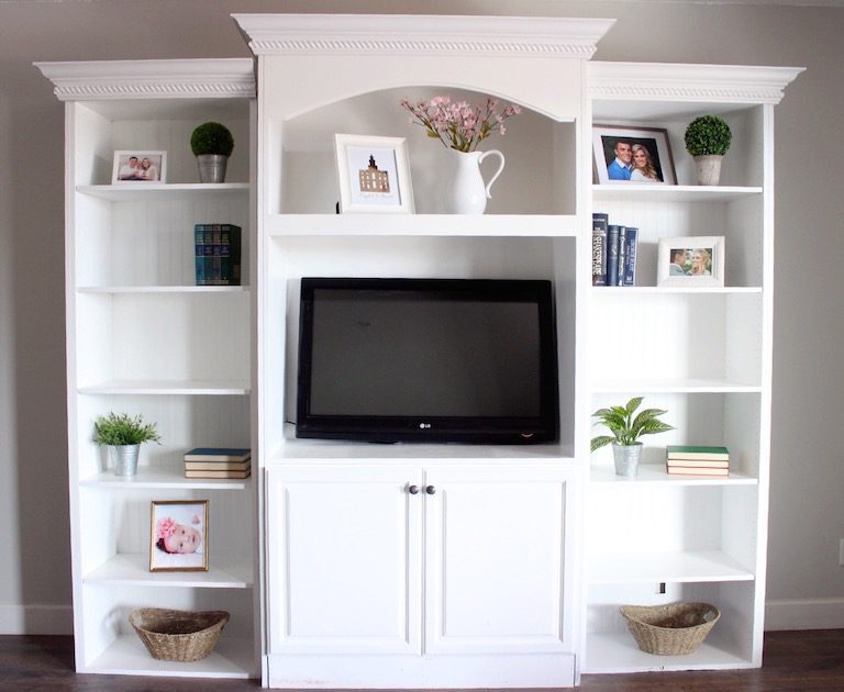 styled white bookshelf