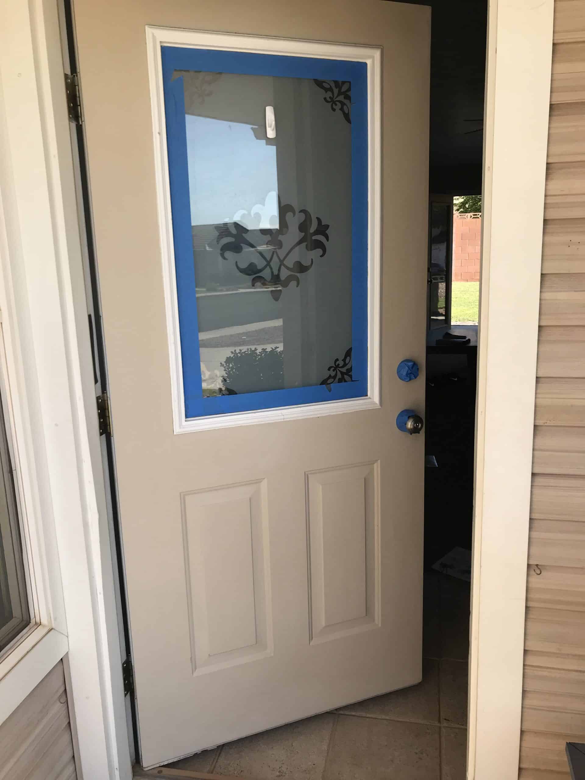 blue painters tape on exterior door