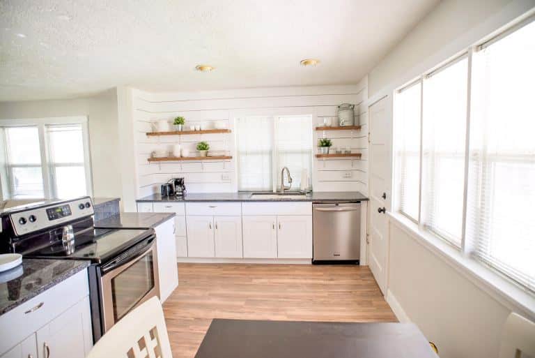 New white kitchen with open shelves and shiplap