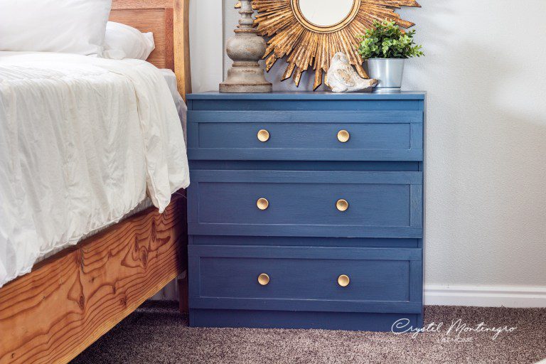 Blue nightstand with gold knobs