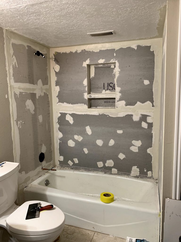 Drywall and joint compound on shower wall