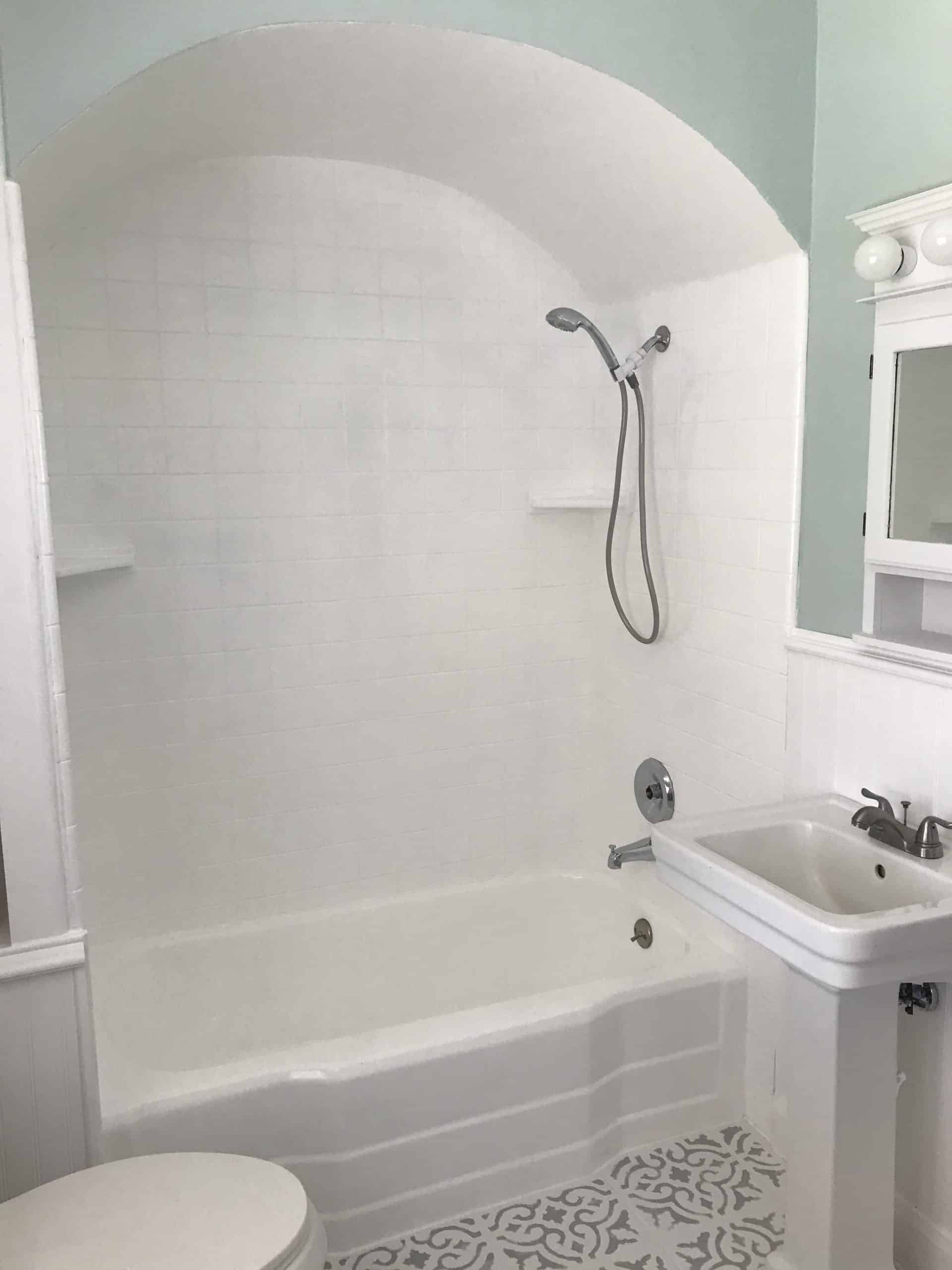 Painted white tile in shower