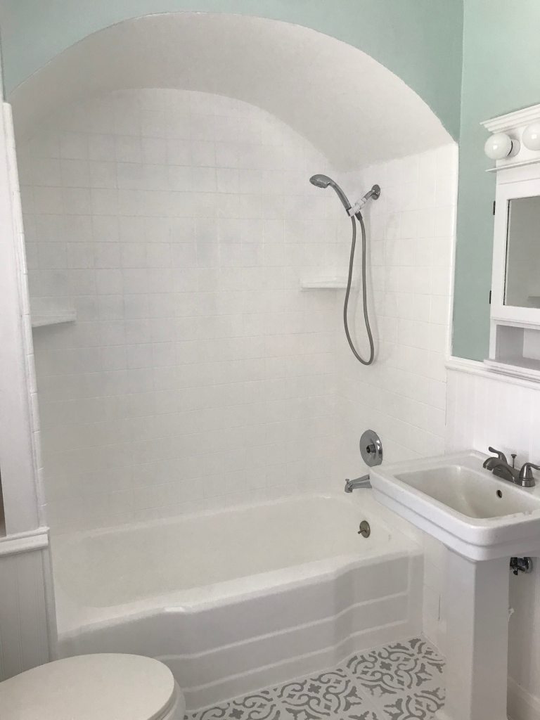 White painted tile in shower