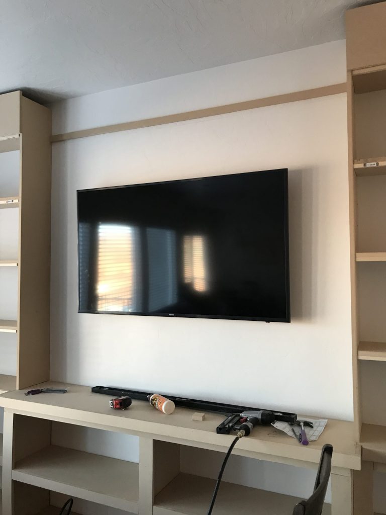 TV hung on a wall