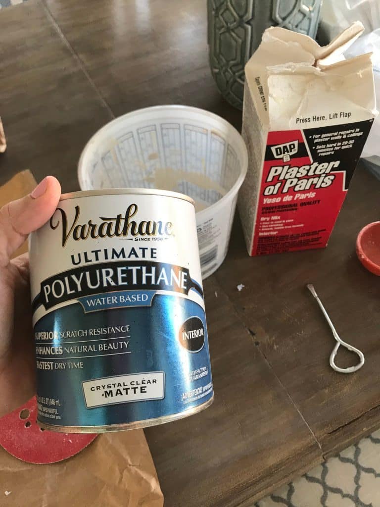 Can of polyurethane and plaster of paris