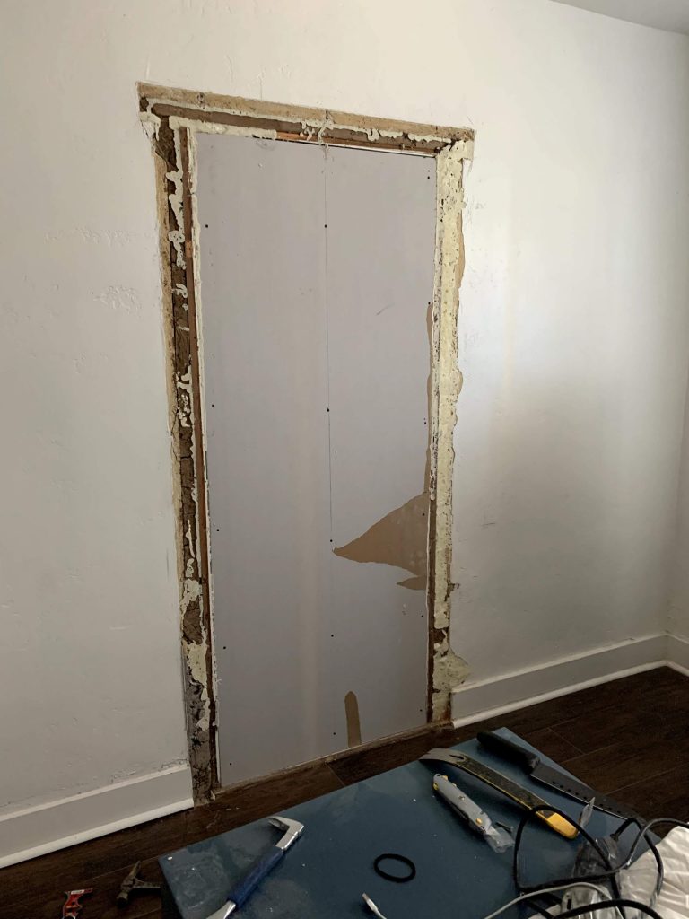 Drywall door and foam insulation