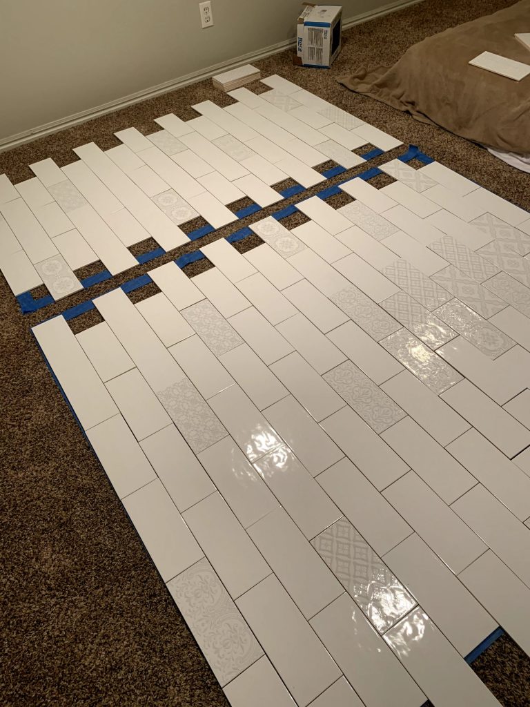 Tile laying on the floor